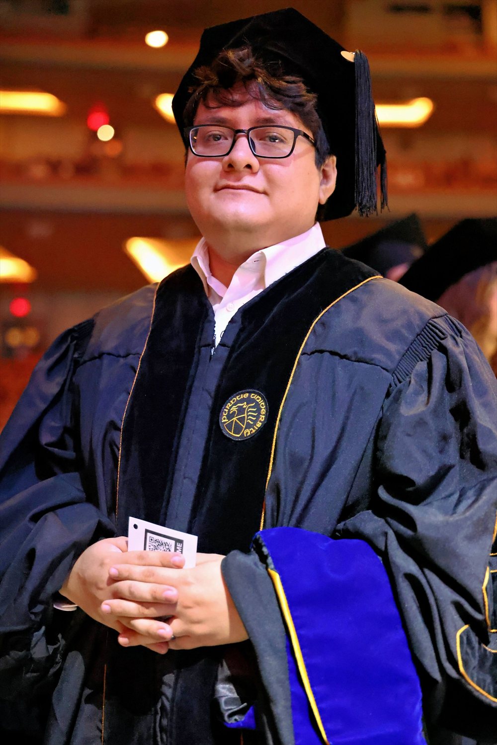 Daniel Flores Galiote in academic regalia